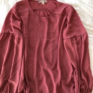 Womens blush top with cuffed sleeves